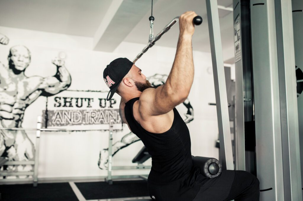 person doing lat pulldown exercise